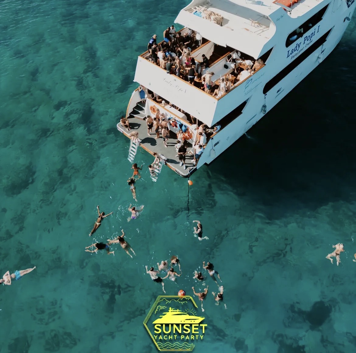 Boat party guests enjoying a sunny cruise in Ayia Napa